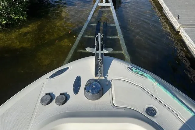  Yacht Photos Pics Bow view of 2007 Hydra-Sports Vector 3300 CC at dock, showing anchor and controls.