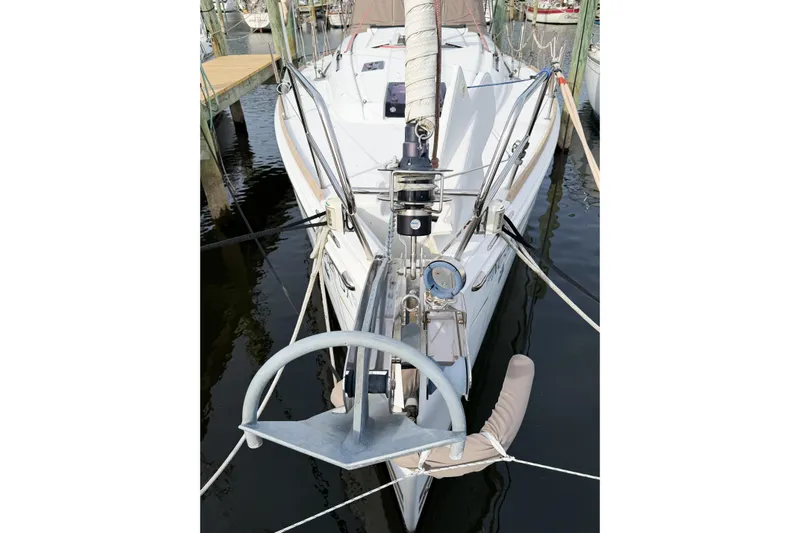 Take Five Yacht Photos Pics 2013 Jeanneau Sun Odyssey 409 sailboat docked, showcasing anchor and rigging details.