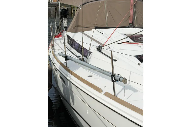 Take Five Yacht Photos Pics 2013 Jeanneau Sun Odyssey 409 sailboat docked, showcasing sleek deck design and rigging.