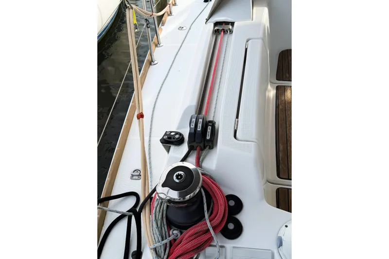 Take Five Yacht Photos Pics Jeanneau Sun Odyssey 409 sailboat deck with winch and ropes, 2013 model.
