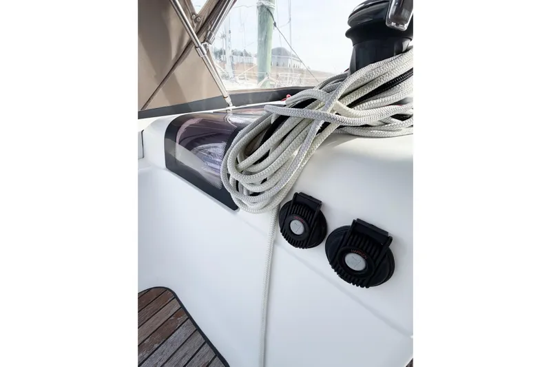 Take Five Yacht Photos Pics Jeanneau Sun Odyssey 409, 2013 model, featuring deck details with ropes and winches.