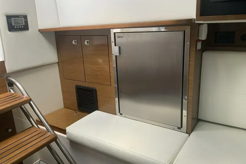  Yacht Photos Pics Interior of 2015 Cruisers Sport Series 328 BR boat with seating and storage.