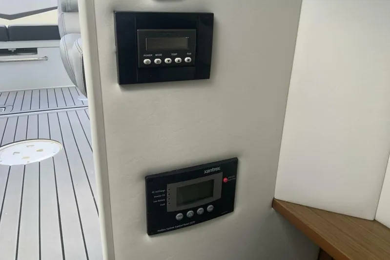  Yacht Photos Pics Control panels on 2015 Cruisers Sport Series 328 BR boat interior.