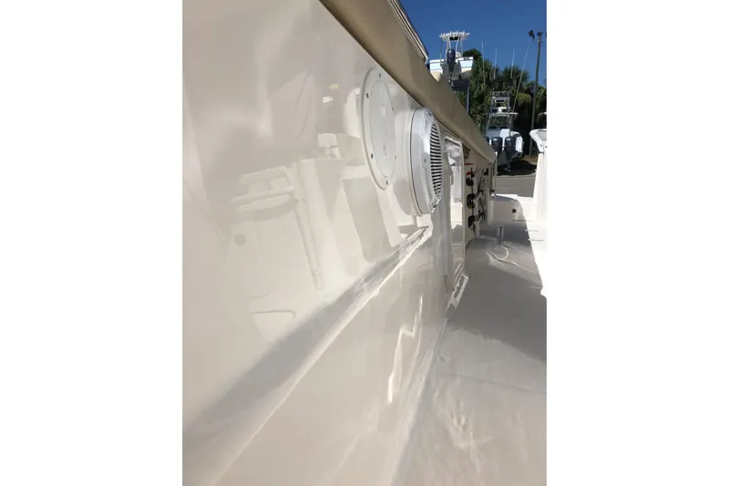  Yacht Photos Pics 2018 Pursuit S 328 Sport boat deck with sleek design and modern features.