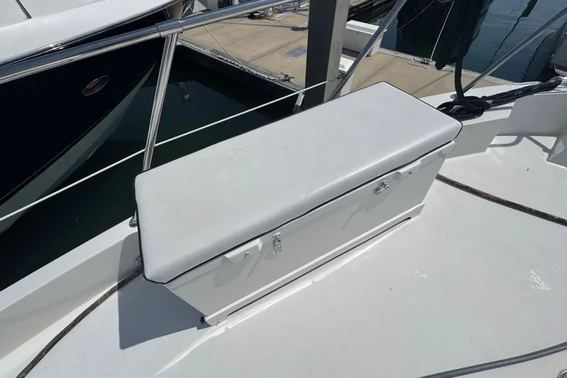 Final Kiwi Yacht Photos Pics Bench seat on 1995 Hatteras 74 Cockpit Motor Yacht deck, near marina.