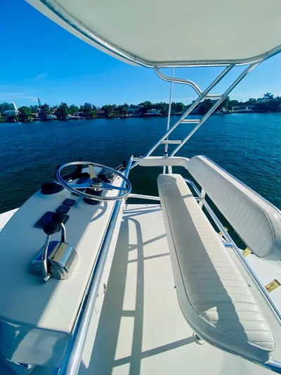  Yacht Photos Pics 1999 Tiara Yachts 43 Open helm with scenic water view.