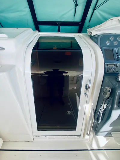  Yacht Photos Pics 1999 Tiara Yachts 43 Open cabin door and control panel.