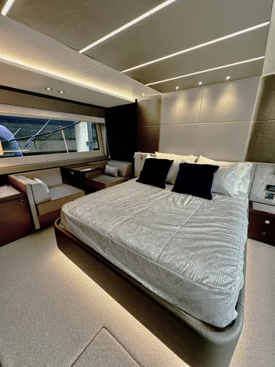 Journey Yacht Photos Pics Luxurious bedroom interior of 2019 Sunseeker 76 Yacht with modern design and ambient lighting.