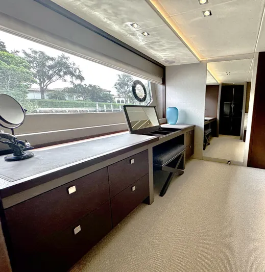 Journey Yacht Photos Pics Luxurious interior of a 2019 Sunseeker 76 Yacht with elegant furnishings and large windows.