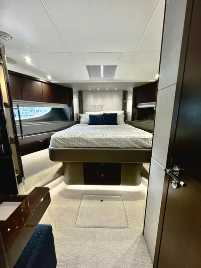Journey Yacht Photos Pics Luxurious bedroom interior of 2019 Sunseeker 76 Yacht with modern design and elegant furnishings.
