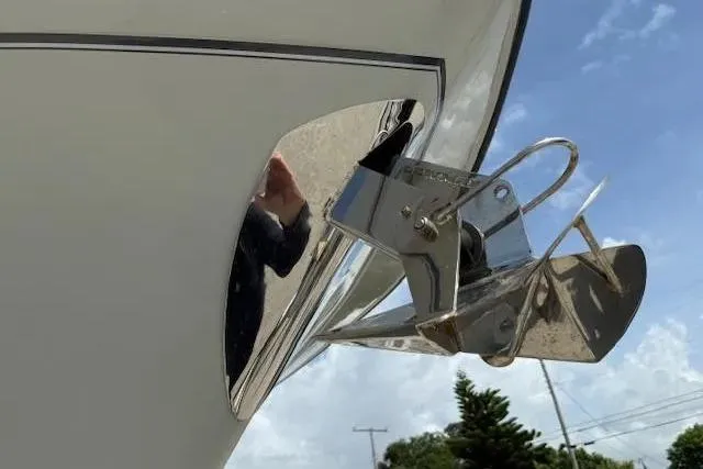 335-514 Brokerage Ron Yacht Photos Pics 2023 Grady-White Freedom 335 boat anchor detail against blue sky.