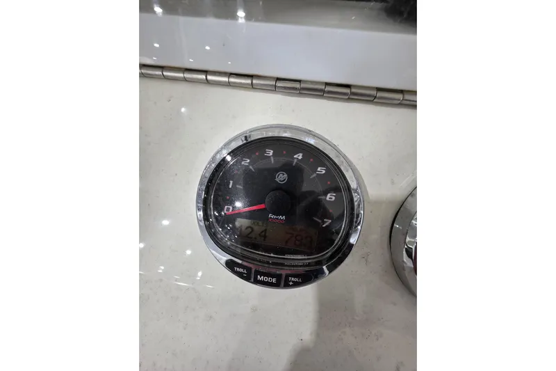 Seavee Yacht Photos Pics Close-up of a 2017 SeaVee 390Z boat tachometer gauge displaying RPM and voltage.