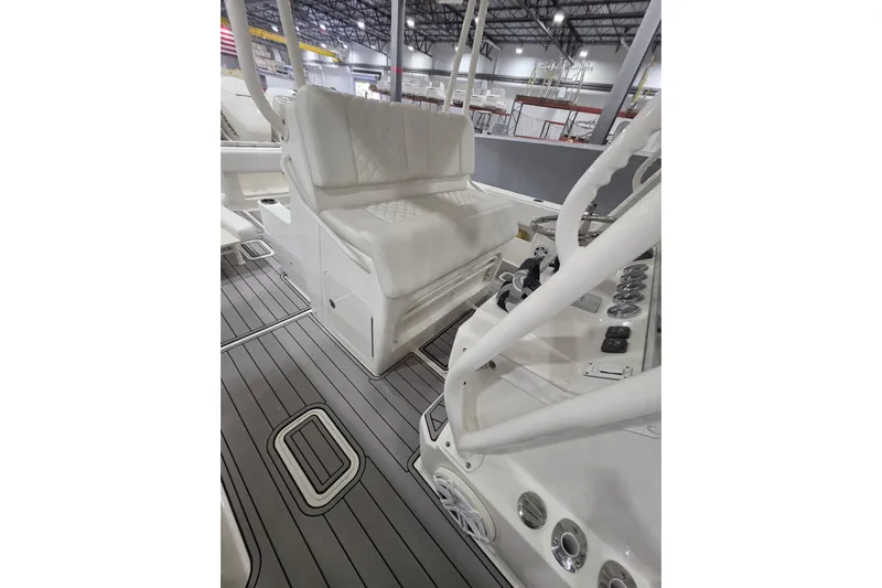 Seavee Yacht Photos Pics 2017 SeaVee 390Z boat interior with white seating and modern controls.