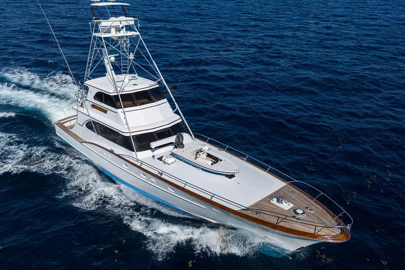  Yacht Photos Pics 1985 Feadship Yacht Fisherman cruising on open sea, showcasing elegant design and craftsmanship.