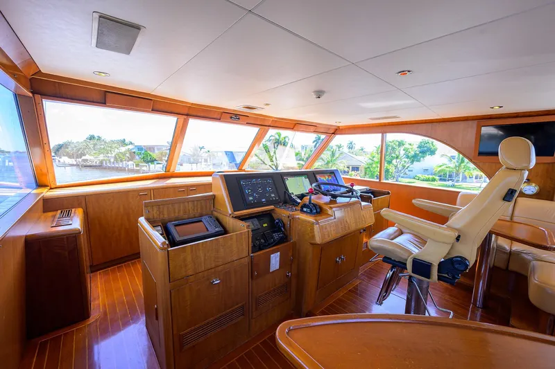  Yacht Photos Pics Luxurious 1985 Feadship Yacht Fisherman helm with modern navigation equipment and panoramic windows.