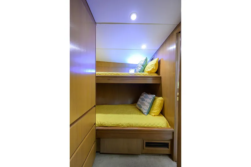  Yacht Photos Pics Bunk beds with yellow bedding in 1985 Feadship Yacht Fisherman cabin.
