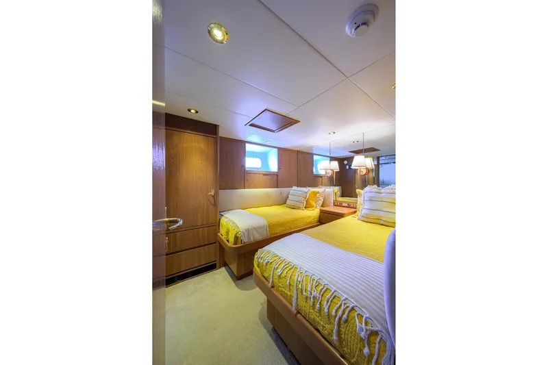 Yacht Photos Pics Luxurious 1985 Feadship Yacht Fisherman cabin with twin beds and elegant wood paneling.