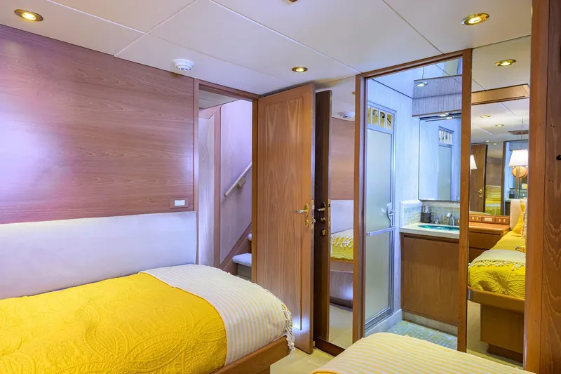  Yacht Photos Pics Luxurious 1985 Feadship Yacht Fisherman cabin with twin beds and elegant wood paneling.