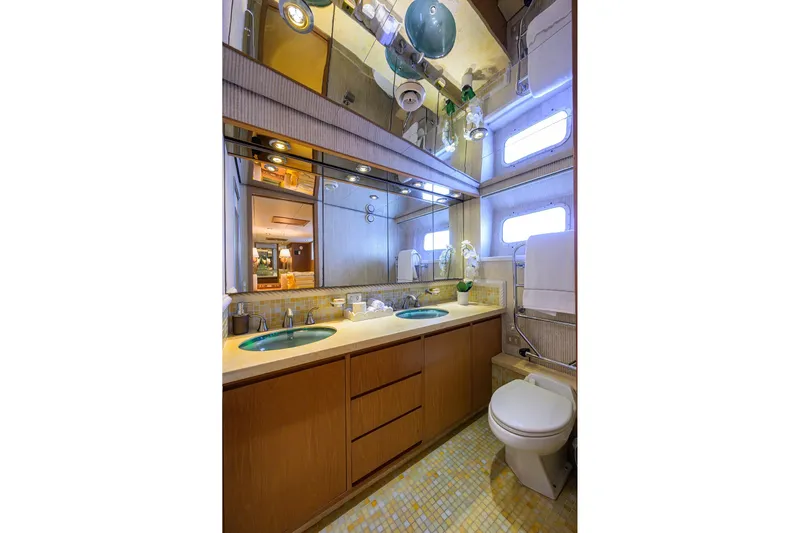  Yacht Photos Pics Luxurious 1985 Feadship Yacht Fisherman bathroom with modern fixtures and elegant design.