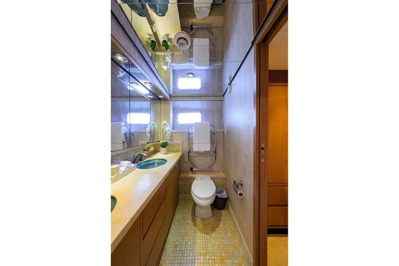  Yacht Photos Pics Luxurious 1985 Feadship Yacht Fisherman bathroom with modern fixtures and elegant design.