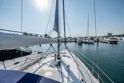Sailboat Hunter 356, 2003 model, docked in a sunny marina.