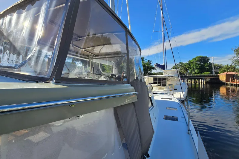 Waterlilly Yacht Photos Pics 2017 Fountaine Pajot Lucia 40 catamaran docked on a sunny day, showcasing sleek design.