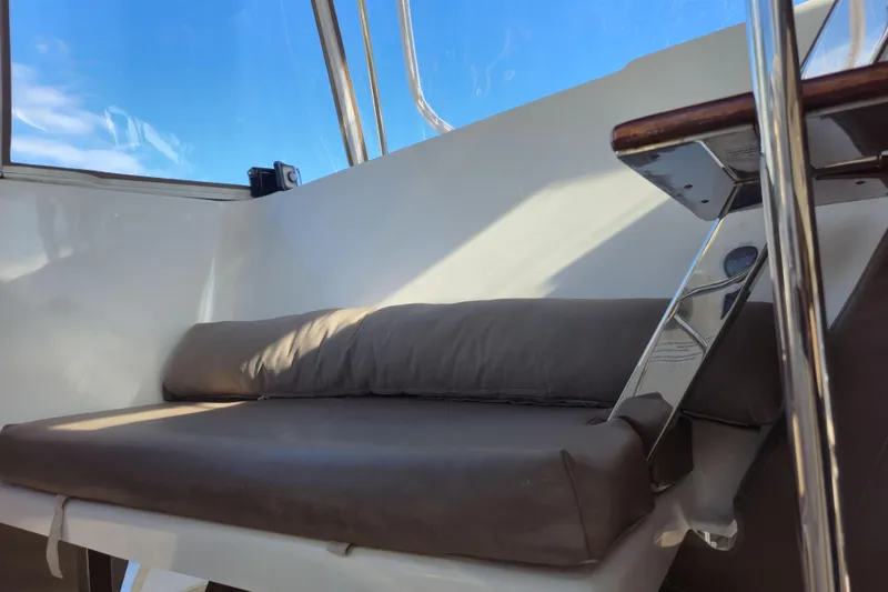 Waterlilly Yacht Photos Pics Interior seating area of 2017 Fountaine Pajot Lucia 40 catamaran, featuring cushioned bench.