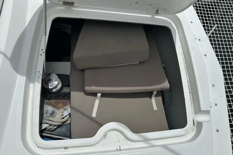 Waterlilly Yacht Photos Pics Storage compartment on 2017 Fountaine Pajot Lucia 40 catamaran with cushions and rope.