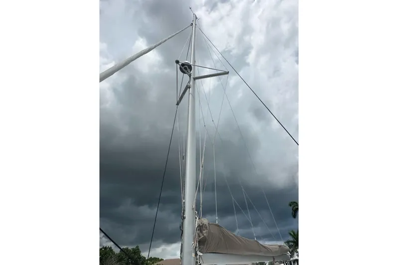 Waterlilly Yacht Photos Pics Mast of 2017 Fountaine Pajot Lucia 40 sailboat against stormy sky.
