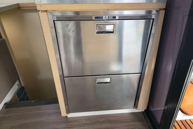 Waterlilly Yacht Photos Pics Stainless steel double-drawer fridge in 2017 Fountaine Pajot Lucia 40 yacht interior.