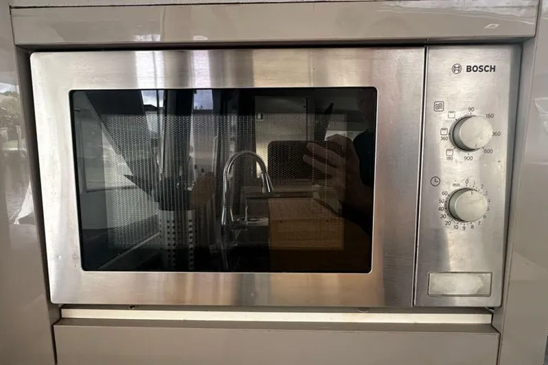 Waterlilly Yacht Photos Pics Built-in Bosch microwave oven with stainless steel finish on a Fountaine Pajot Lucia 40 yacht.
