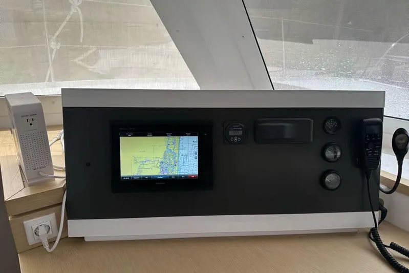 Waterlilly Yacht Photos Pics Navigation panel of 2017 Fountaine Pajot Lucia 40 catamaran with electronic display and controls.