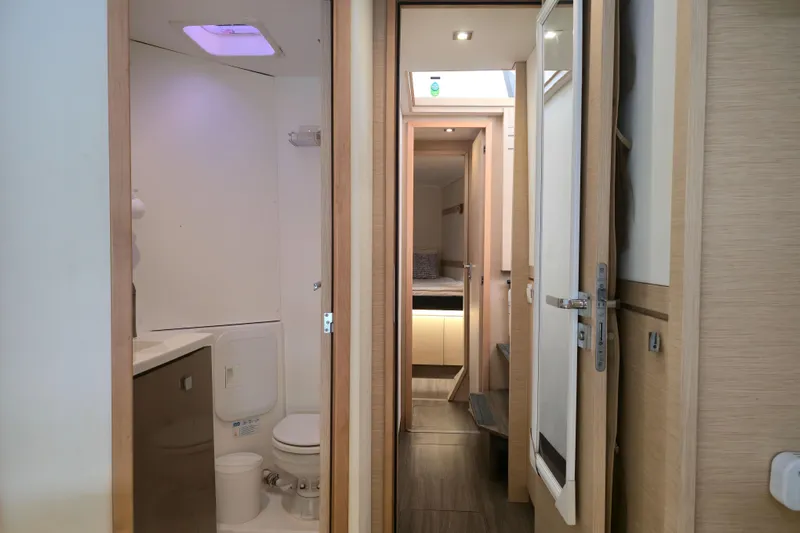 Waterlilly Yacht Photos Pics 2017 Fountaine Pajot Lucia 40 interior with bathroom and cabin view.