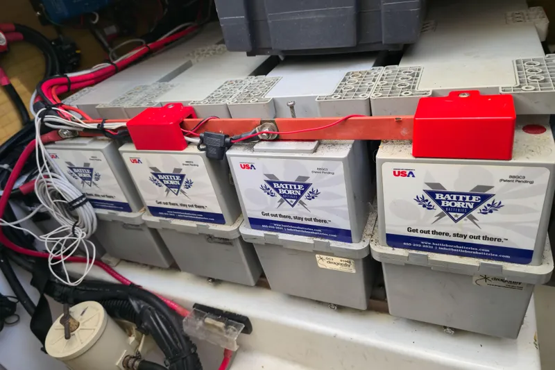 Waterlilly Yacht Photos Pics Battery setup in a 2017 Fountaine Pajot Lucia 40 catamaran, featuring Battle Born batteries.