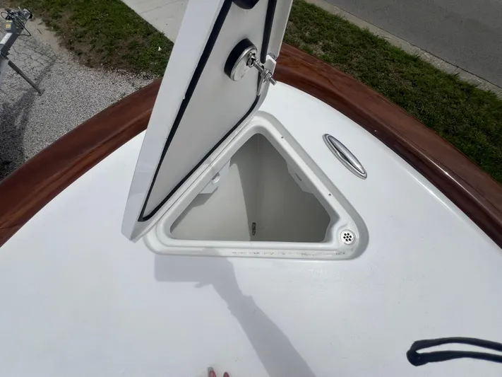  Yacht Photos Pics Open storage compartment on 2026 Pair Customs 27 Center Console boat.