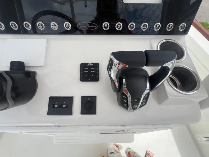  Yacht Photos Pics Control panel of 2026 Pair Customs 27 Center Console boat with modern throttle and switches.