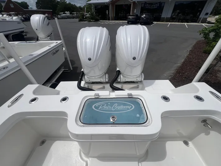  Yacht Photos Pics 2026 Pair Customs 27 Center Console boat with dual engines and branded livewell.