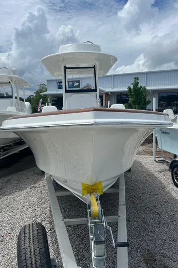 Yacht Photos Pics 2026 Pair Customs 27 Center Console boat on trailer, displayed outdoors.