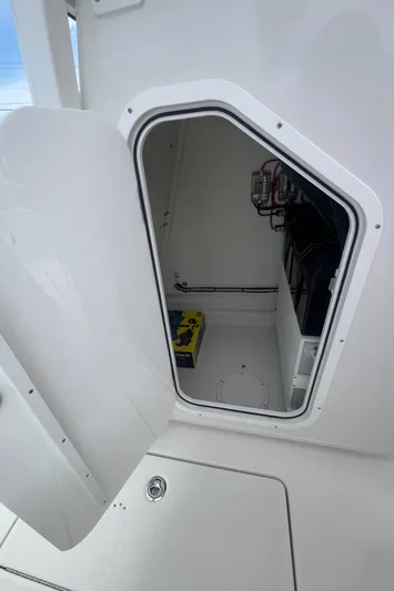  Yacht Photos Pics Open storage compartment on 2026 Pair Customs 27 Center Console boat.