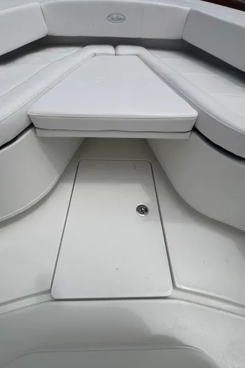  Yacht Photos Pics 2026 Pair Customs 27 Center Console boat interior with cushioned seating and storage compartment.