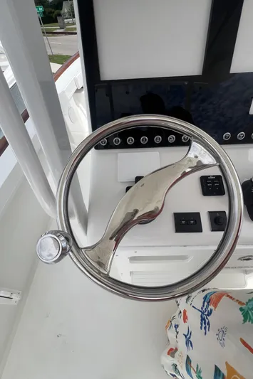  Yacht Photos Pics 2026 Pair Customs 27 Center Console steering wheel and dashboard controls.
