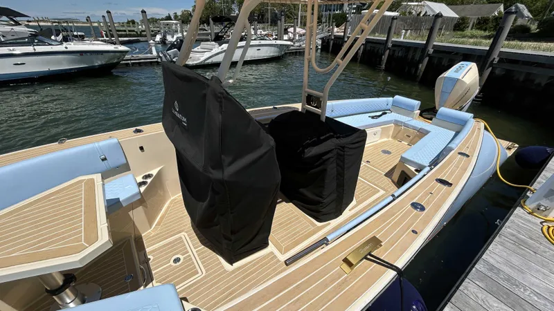  Yacht Photos Pics Luxury Lilybaeum Levenzo 2025 boat docked, featuring spacious deck and modern design.