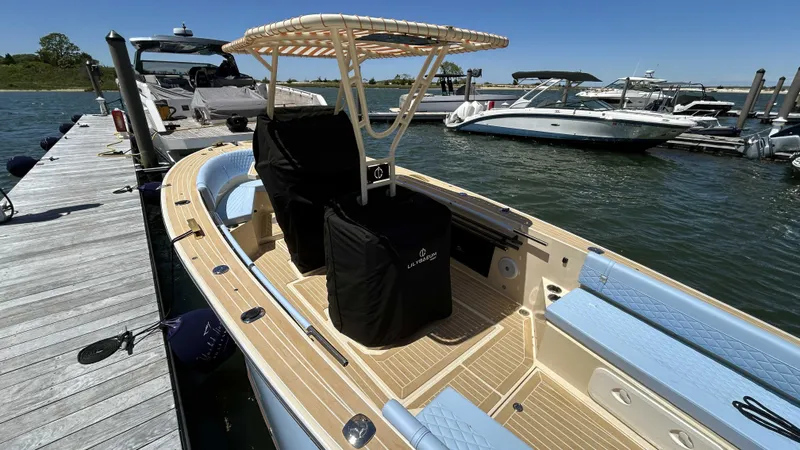  Yacht Photos Pics 2025 Lilybaeum Levenzo boat docked at marina, featuring sleek design and modern amenities.