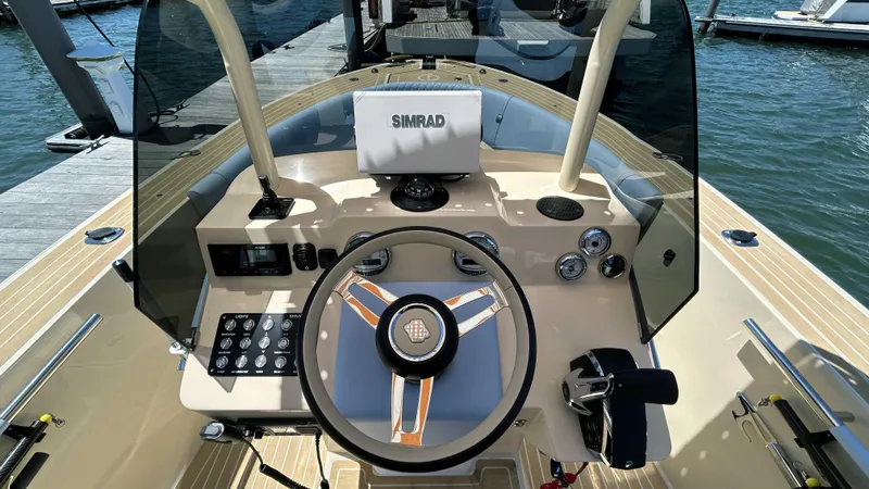 Yacht Photos Pics 2025 Lilybaeum Levenzo boat dashboard with steering wheel and navigation controls.