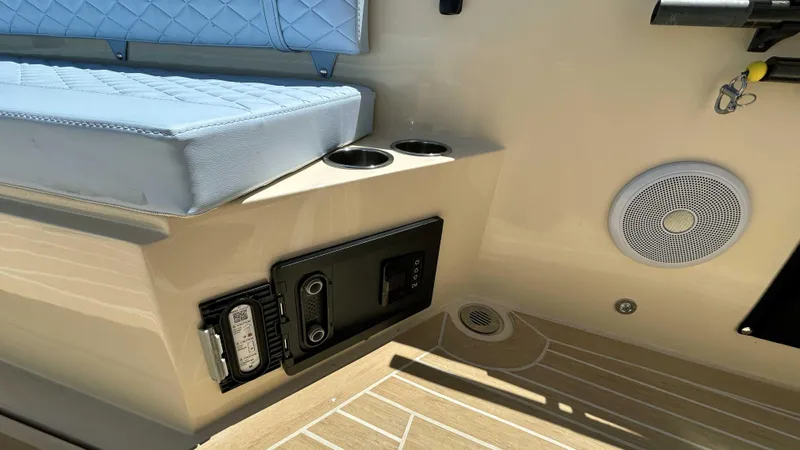  Yacht Photos Pics Interior of 2025 Lilybaeum Levenzo boat with blue seating and speaker system.