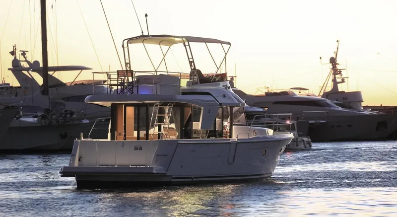 Vitamin Sea Yacht Photos Pics Beneteau Swift Trawler 35, 2021, docked at sunset.
