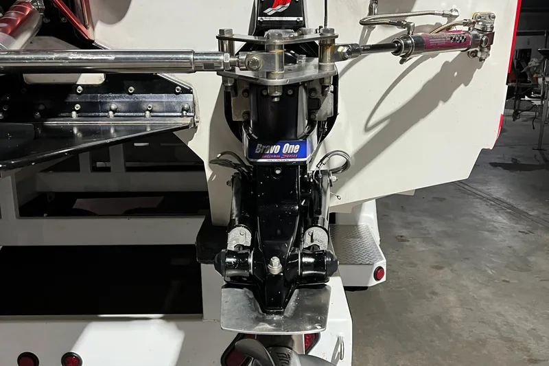  Yacht Photos Pics 2004 Spectre 36 Cat boat engine detail with Bravo One drive in a garage setting.