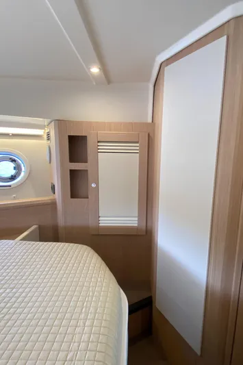  Yacht Photos Pics 2026 Beneteau 41 Swift Trawler FLY cabin interior with modern wood finish.