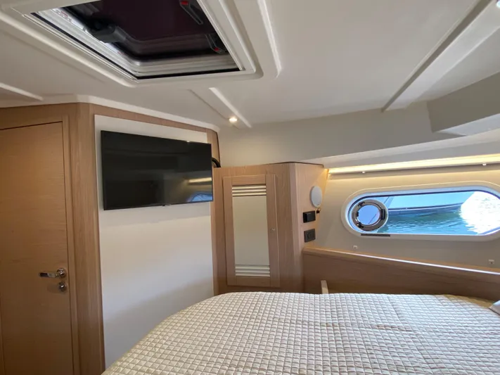  Yacht Photos Pics Luxurious cabin interior of 2026 Beneteau 41 Swift Trawler FLY with ocean view.