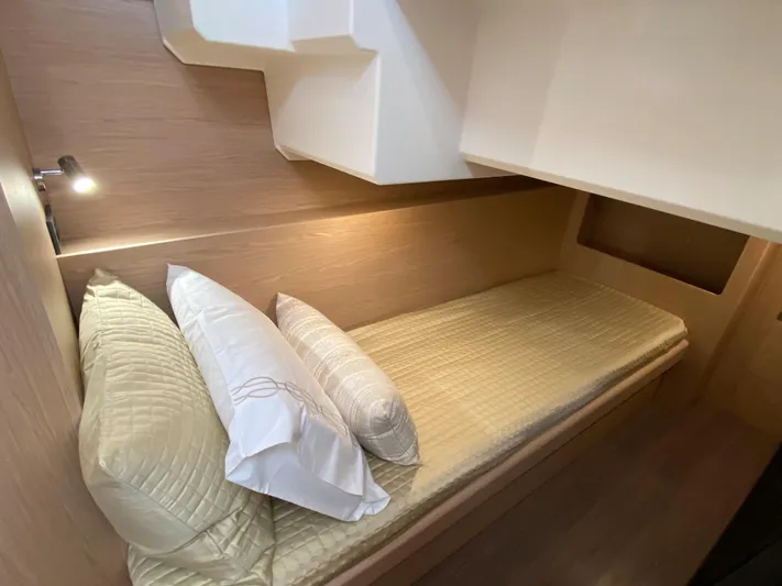  Yacht Photos Pics Cozy cabin bed in 2026 Beneteau 41 Swift Trawler FLY yacht interior.